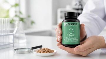 Medical scientist holding a BoostCeuticals Nattokinase 4000 FU bottle in a lab